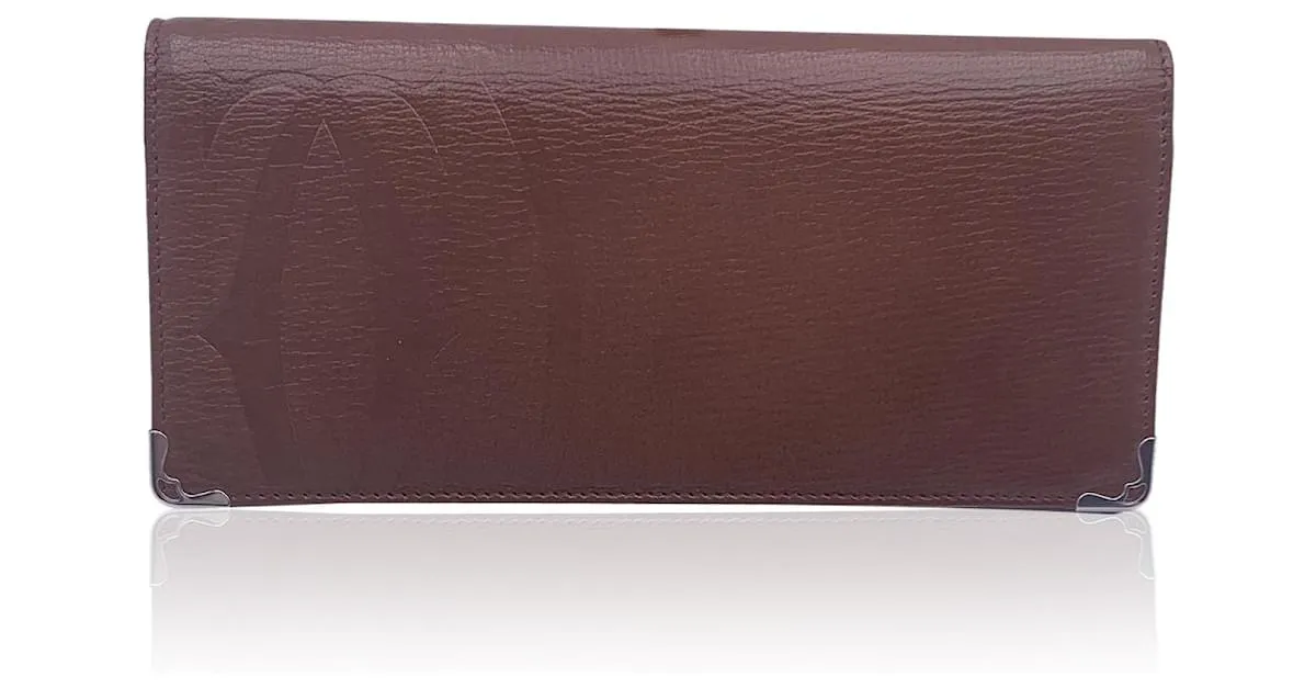 Cartier Monedero largo plegable con logo en relieve de cuero marrón Castaño 