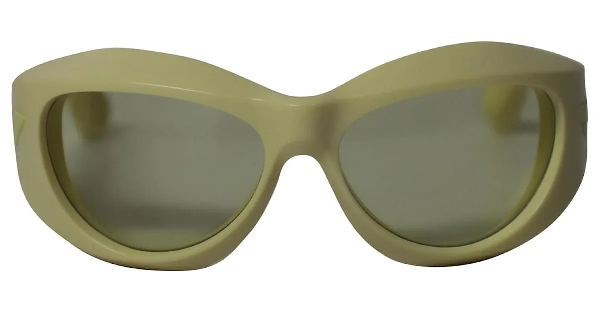 Gafas de sol redondas de inyección gruesa en acetato amarillo de Bottega Veneta 