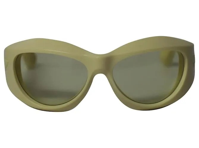 Gafas de sol redondas de inyección gruesa en acetato amarillo de Bottega Veneta 