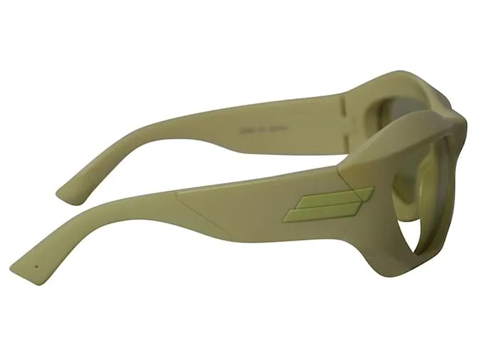 Gafas de sol redondas de inyección gruesa en acetato amarillo de Bottega Veneta 