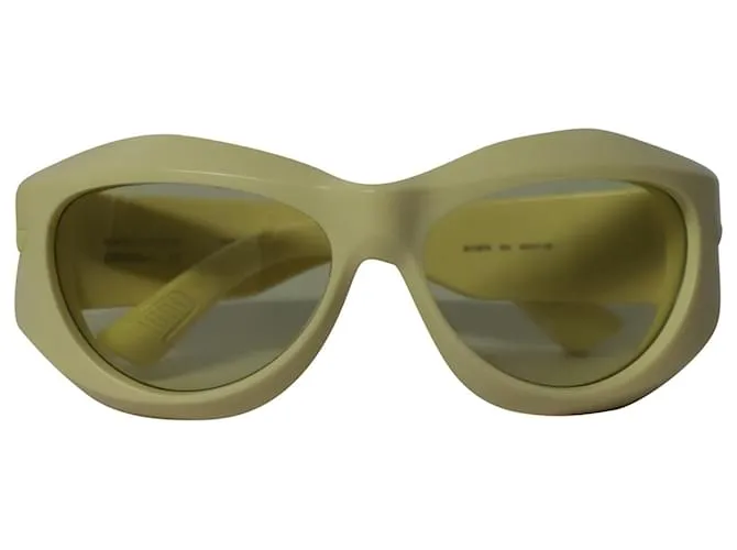 Gafas de sol redondas de inyección gruesa en acetato amarillo de Bottega Veneta 