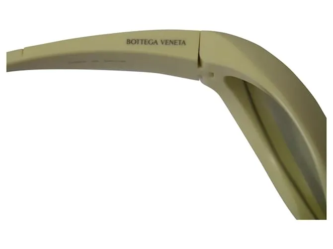 Gafas de sol redondas de inyección gruesa en acetato amarillo de Bottega Veneta 
