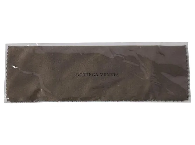 Gafas de sol redondas de inyección gruesa en acetato amarillo de Bottega Veneta 