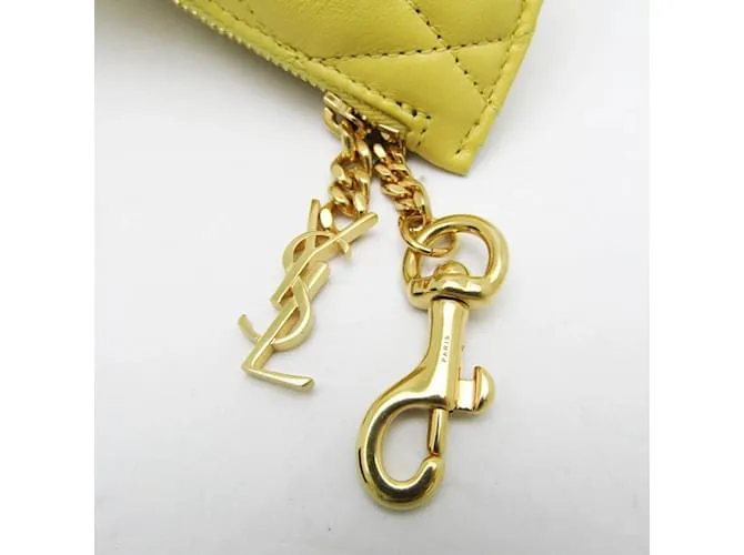 Monedero de cuero amarillo acolchado Saint Laurent 