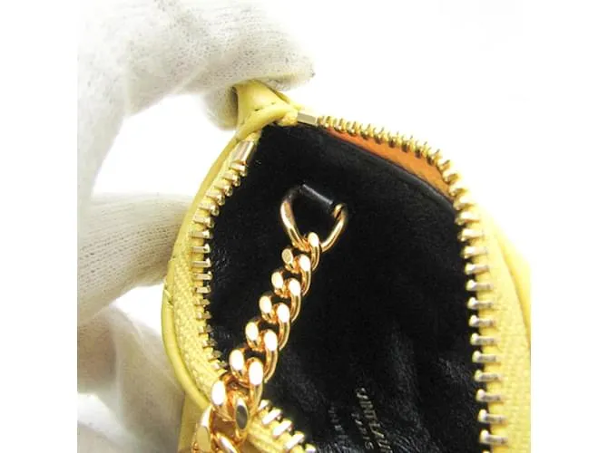 Monedero de cuero amarillo acolchado Saint Laurent 