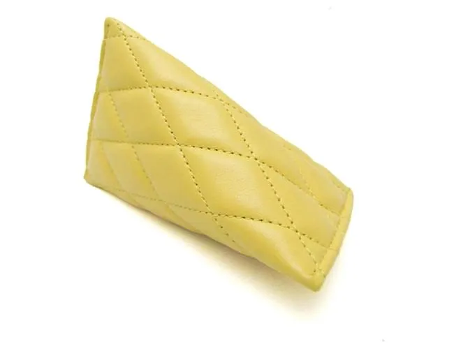 Monedero de cuero amarillo acolchado Saint Laurent 
