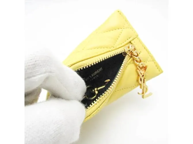 Monedero de cuero amarillo acolchado Saint Laurent 