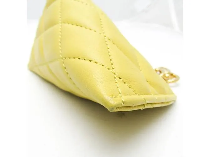 Monedero de cuero amarillo acolchado Saint Laurent 