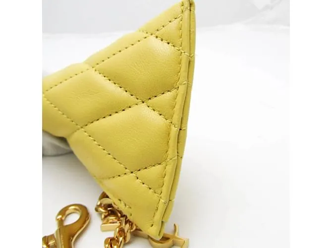 Monedero de cuero amarillo acolchado Saint Laurent 