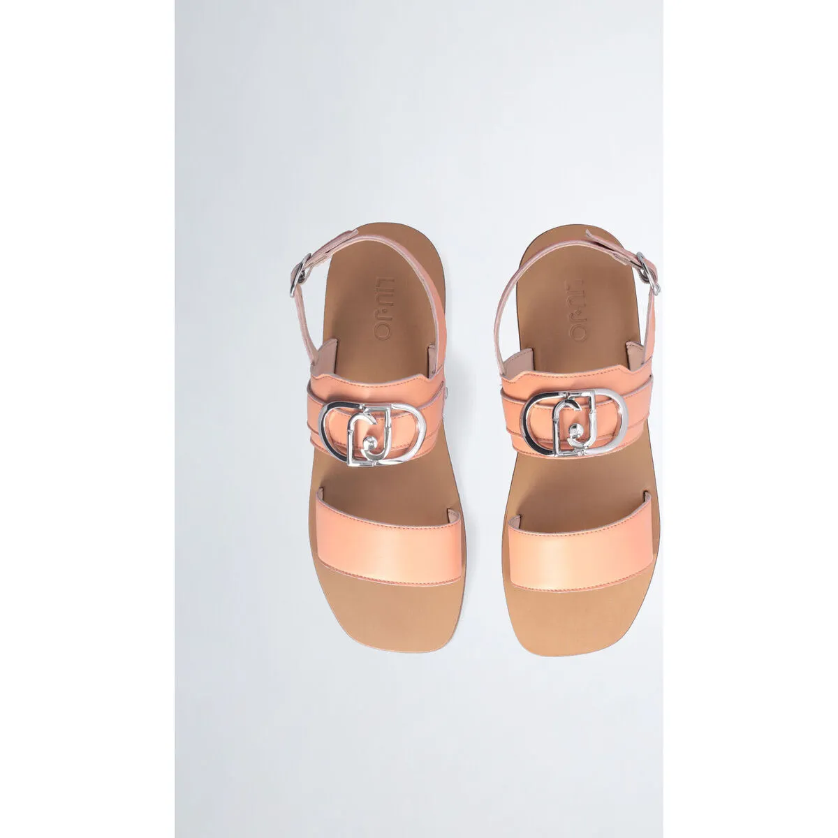 Sandalias planas de piel