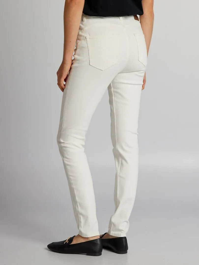 VAQUERO SKINNY DE TIRO ALTO  L32  BLANCO